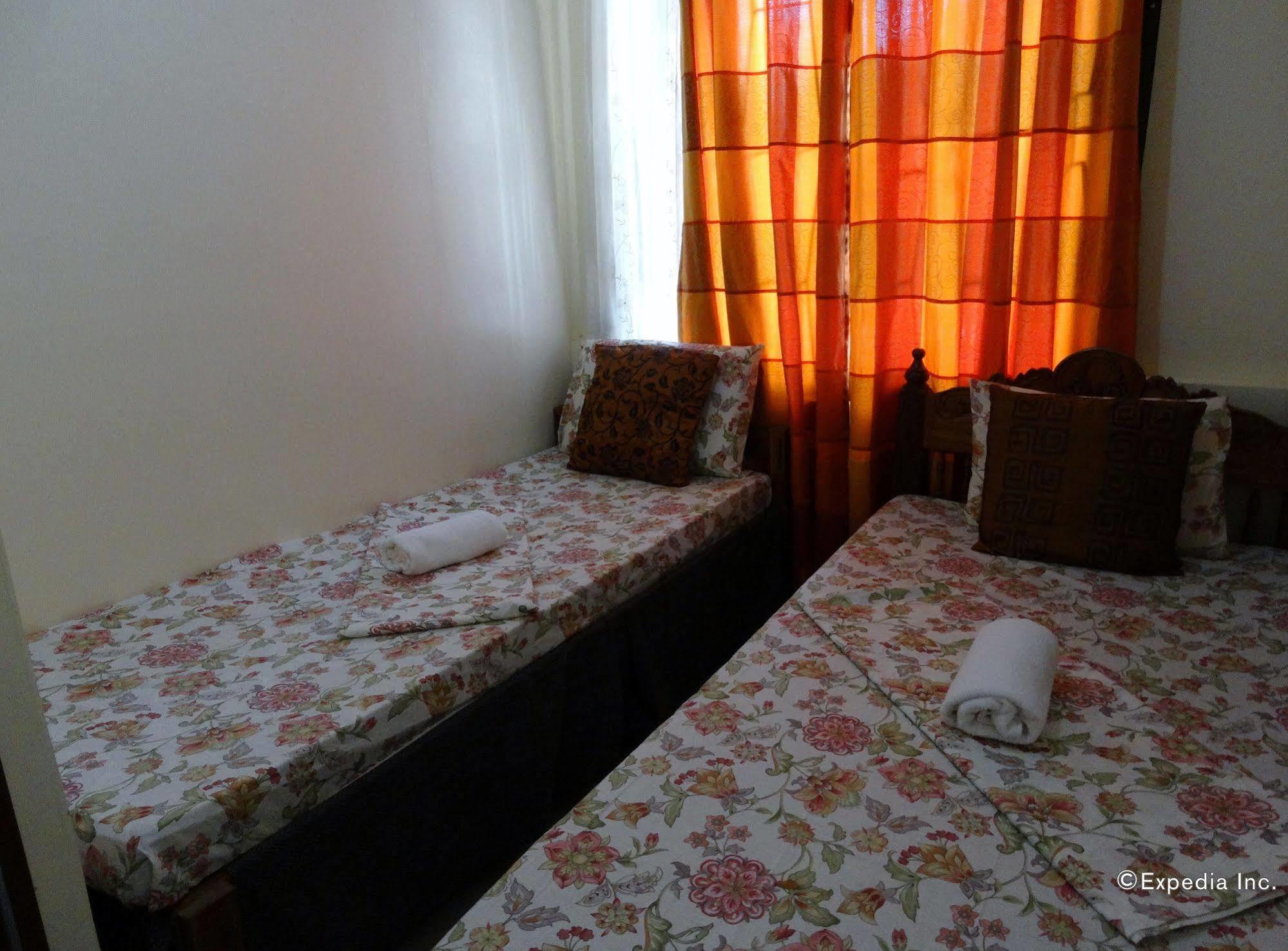 D'Lucky Garden Inn & Suites Tiniguiban Bagian luar foto