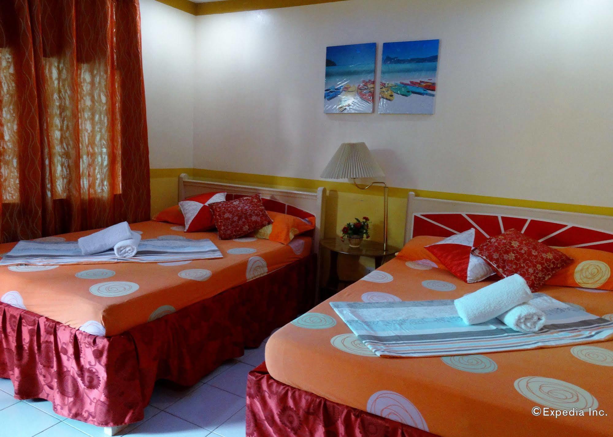 D'Lucky Garden Inn & Suites Tiniguiban Bagian luar foto