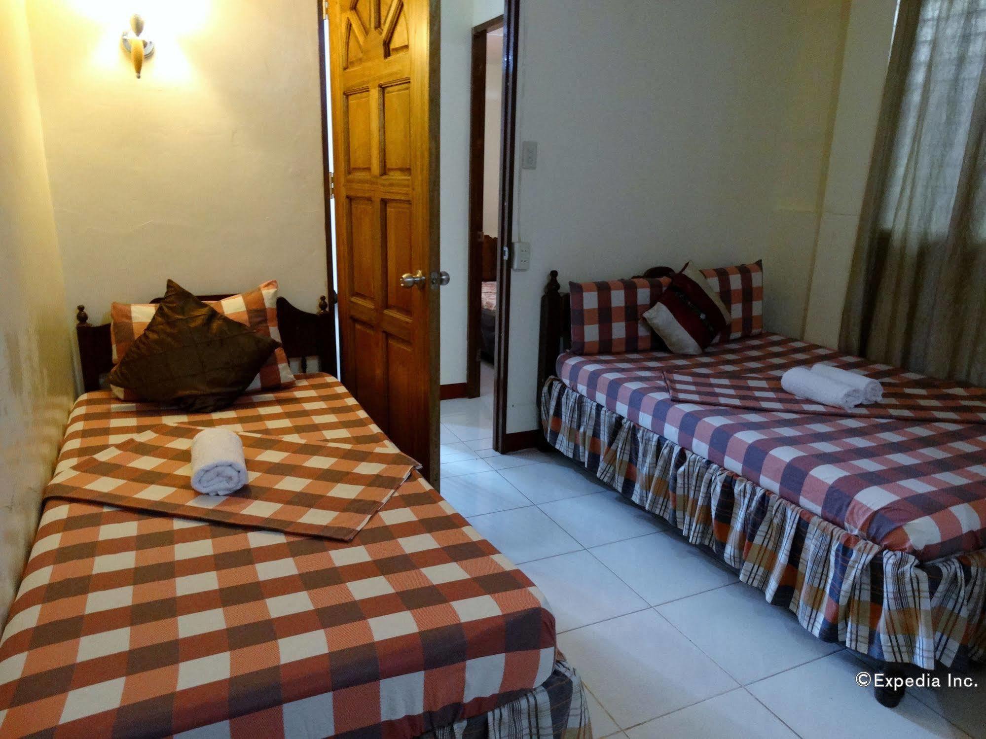 D'Lucky Garden Inn & Suites Tiniguiban Bagian luar foto