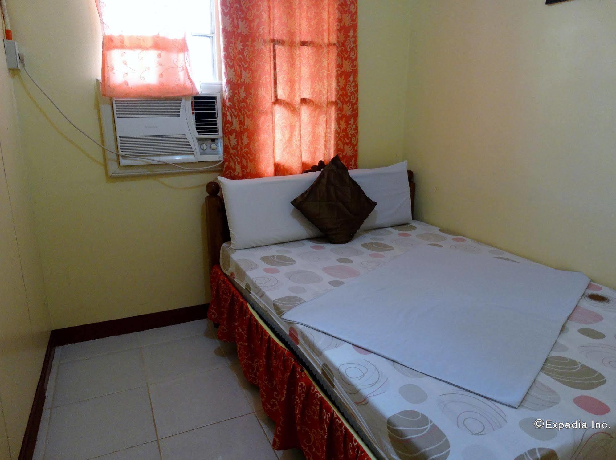 D'Lucky Garden Inn & Suites Tiniguiban Bagian luar foto